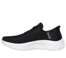 Black sneaker with white sole on a white background