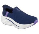 Navy slip-on shoe with white sole on a white background