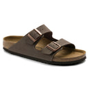 Brown sandal with leather straps on a white background