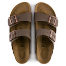 Pair of brown Birkenstock sandals on a white background