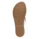 Tan sole of a sandal with 'Dansko' branding on a white background