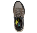 Brown and black sneaker with visible brand logo on a white background