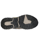 Close-up of a hiking boot sole with tread pattern on a white background
