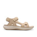 Beige sandal with strap design on a white background