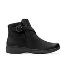 A black ankle boot with a side buckle strap, shown in a side profile view against a plain white background.