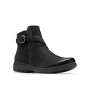 A black leather ankle boot with a side buckle strap, shown from a three-quarters angle on a white background.