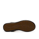 Brown shoe sole with 'Clarks' branding on a white background