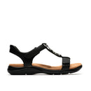 Black sandal with a brown insole on a white background