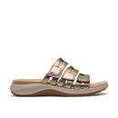 Gold sandal with a white background
