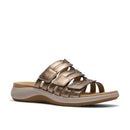 Gold sandal with multiple straps on a white background