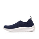 Navy slip-on shoe with white sole on a white background