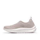 Gray slip-on shoe with white sole on a white background