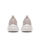 Pair of light gray slip-on sneakers on a white background