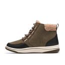 A mid-height lace-up boot with an olive green suede upper, black toe and heel panels, a cream-colored sole, and a beige sherpa lining visible at the collar and pull tab, shown from a side profile on a white background.