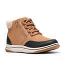 A mid-height ankle boot sneaker in tan suede and black faux leather, featuring a side zipper, matching laces, a cream shearling lining at the collar, and a thick white and tan sole.