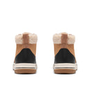 A pair of mid-height ankle boots shown from the back, featuring tan leather uppers, a black leather heel panel, a thick cream midsole, and a fluffy cream shearling lining at the collar.