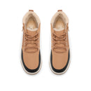 A pair of beige ankle boots with a soft cream shearling lining, beige laces, and black midsoles, shown from a top-down view on a white background.