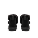 A pair of black mid-calf winter boots with plush faux-fur trim around the collar and small pom-pom details, shown from the back on a solid white background.