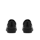 A pair of black leather slip-on shoes shown from the back, positioned side-by-side on a solid white background.