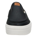 Black slip-on sneaker with white sole on a white background