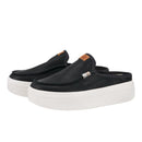 Black slip-on shoes with white soles on a white background