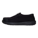 Black shoe with a strap on a white background