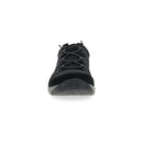 Black sneaker with gray sole on a white background