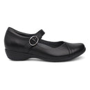 A single black Mary Jane-style shoe with a low wedge heel and a silver-tone buckle strap, shown in a side profile on a white background.