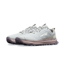 White athletic shoe with a black sole on a white background