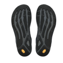 The soles of a pair of shoes, shown from above on a plain white background. The soles are black with a textured tread pattern and small yellow Vibram logos near the heel.