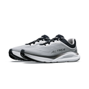 A pair of Altra running shoes in light gray and white with black accents, shown from a side profile view on a white background.