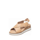 Beige sandal with a white sole on a white background