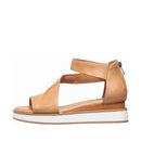 Tan sandal with a white sole on a white background