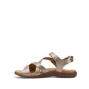 Gold sandal with brown sole on a white background