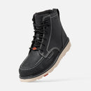 Black leather boot with white sole on a light gray background