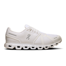 White sneaker with a logo on a black background
