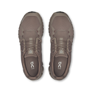 Pair of brown athletic shoes on a white background