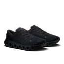 A pair of black On running shoes with textured mesh uppers, matching black laces, and a chunky black sole, displayed on a clean white background.