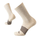 Pair of beige socks with black striped accents on a white background