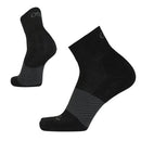 Pair of black socks with a subtle pattern on a white background