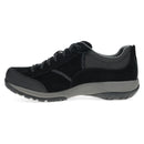 Black leather loafer shoe on a white background