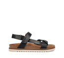 Black sandal with cork sole on a white background