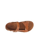 Brown sandal with 'taos' branding on a white background