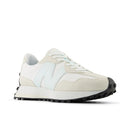 White sneaker with black sole on a white background