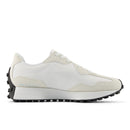 White sneaker with beige accents on a white background