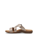 Beige sandal with a brown sole on a white background