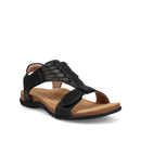 Black sandal with brown sole on a white background