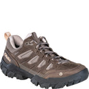 Brown hiking shoe with black sole on a white background