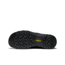 Black shoe with a prominent sole on a white background