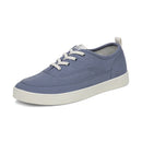 Blue sneaker with white laces on a white background